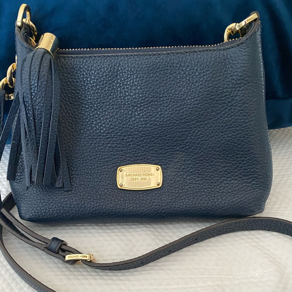 Michael Kors navy blue crossbody purse.